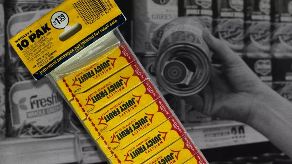 Juicy Fruit gum pack with the first barcode ever scanned, set against a black-and-white grocery store backdrop.