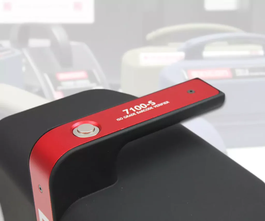 Axicon 7100-S barcode verifier with red handle used for large barcode verification.